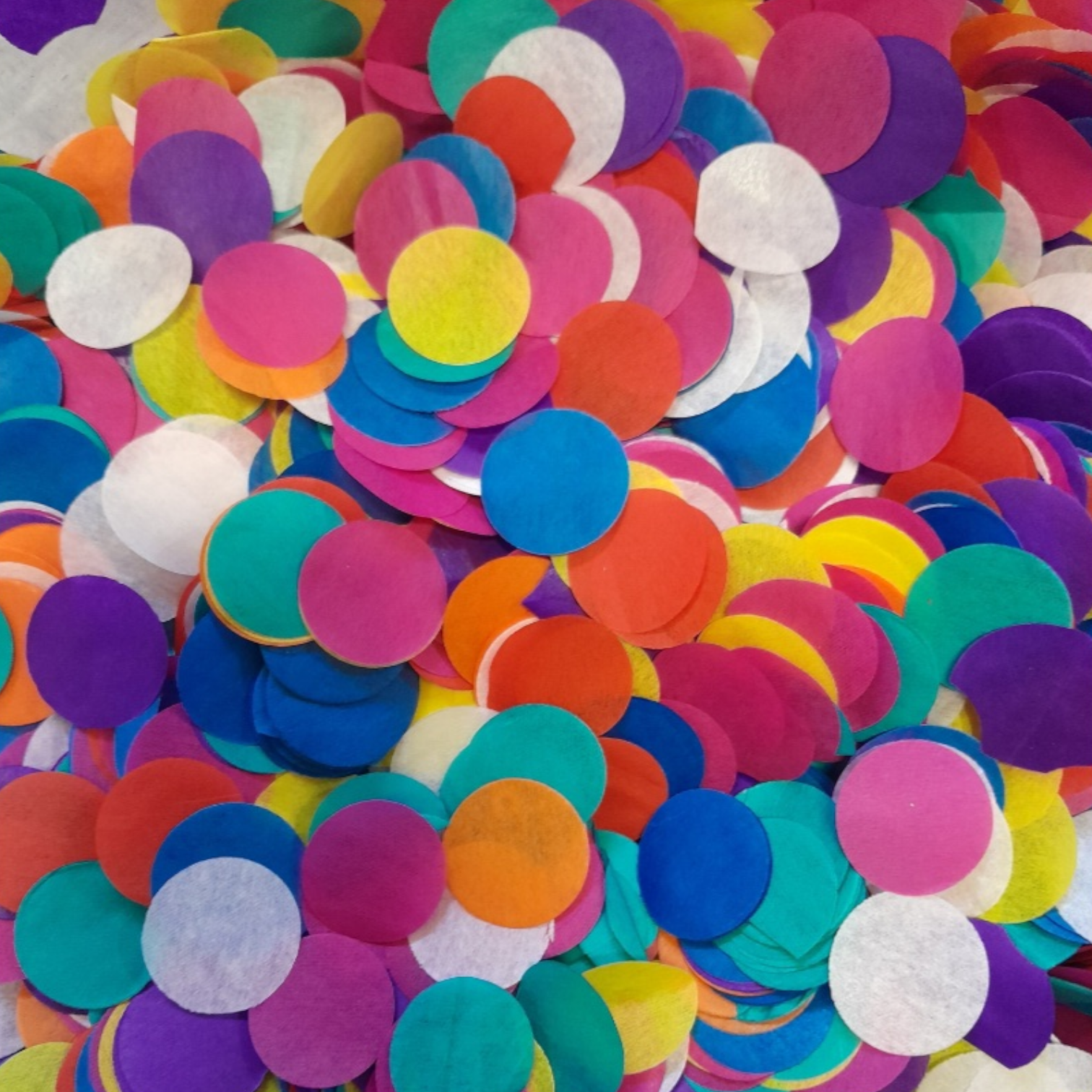 A mix of Rainbow Coloured Tissue Paper Confetti Circles.